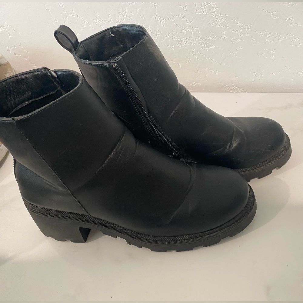 Black leather wedge boots